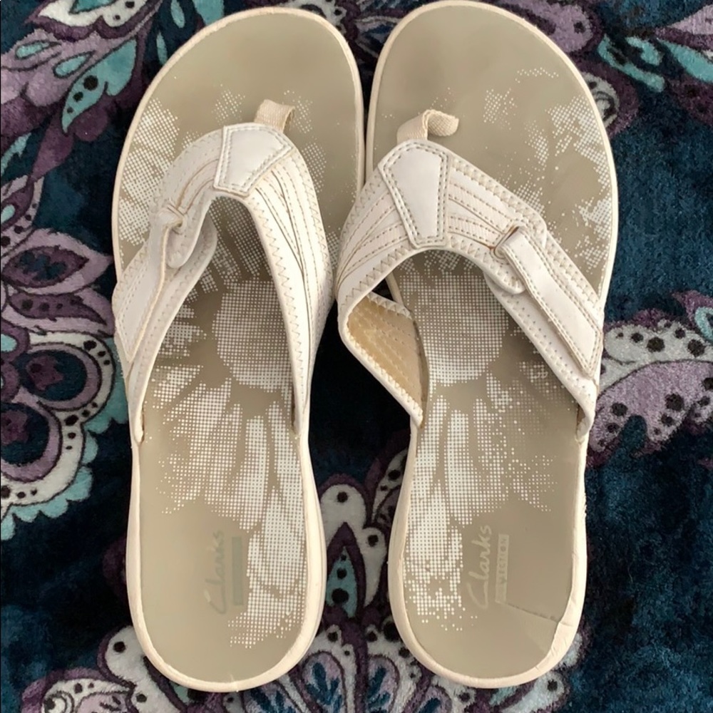 White Clark’s flip flops. Size 10